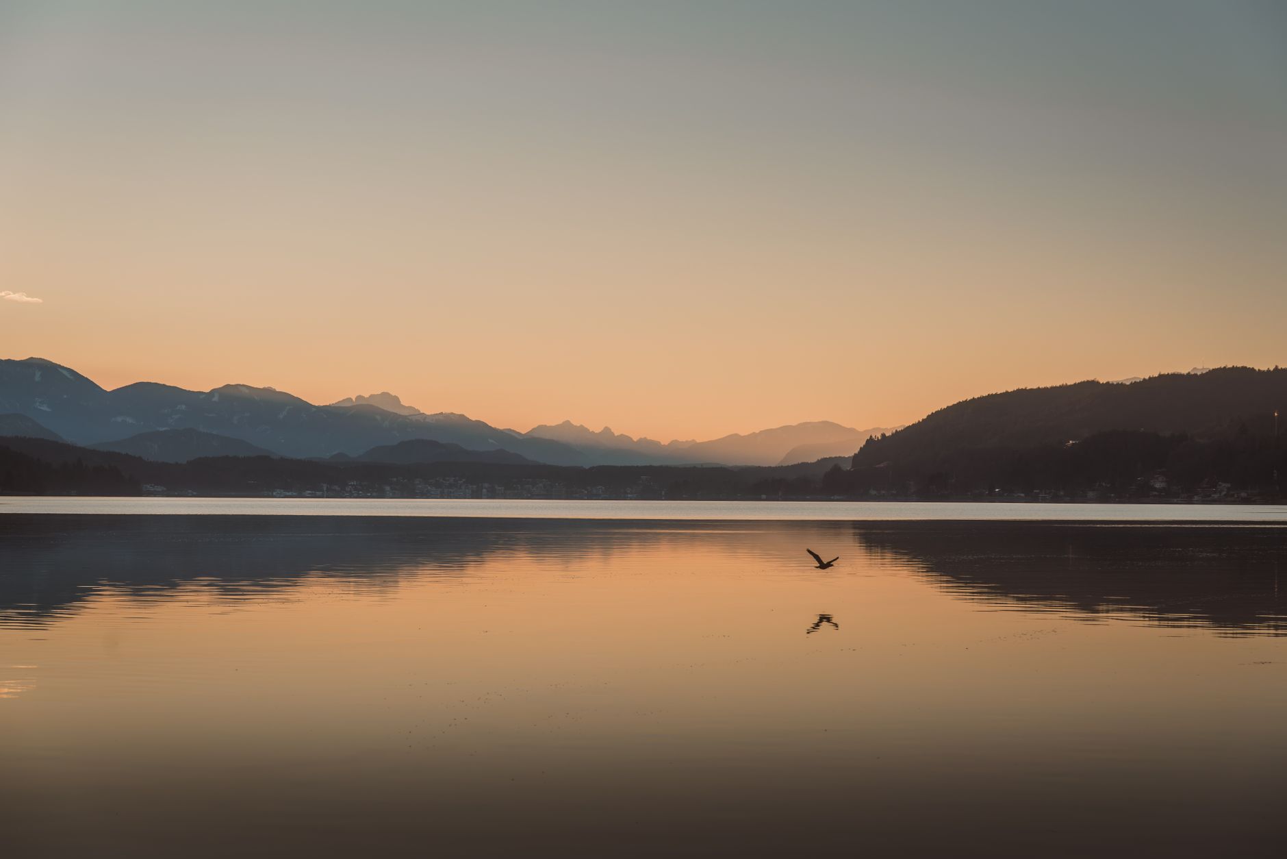 tranquil sunset over mountain lake